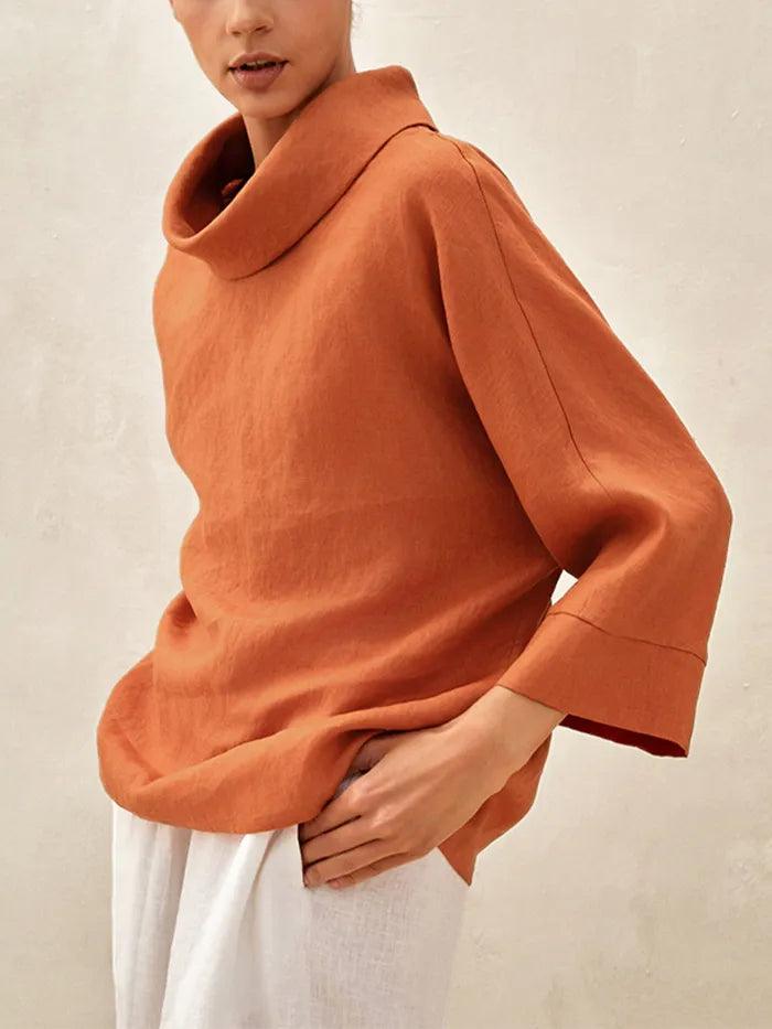 Top de lino con cuello doblado y mangas acampanadas