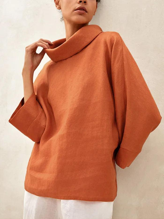 Top de lino con cuello doblado y mangas acampanadas