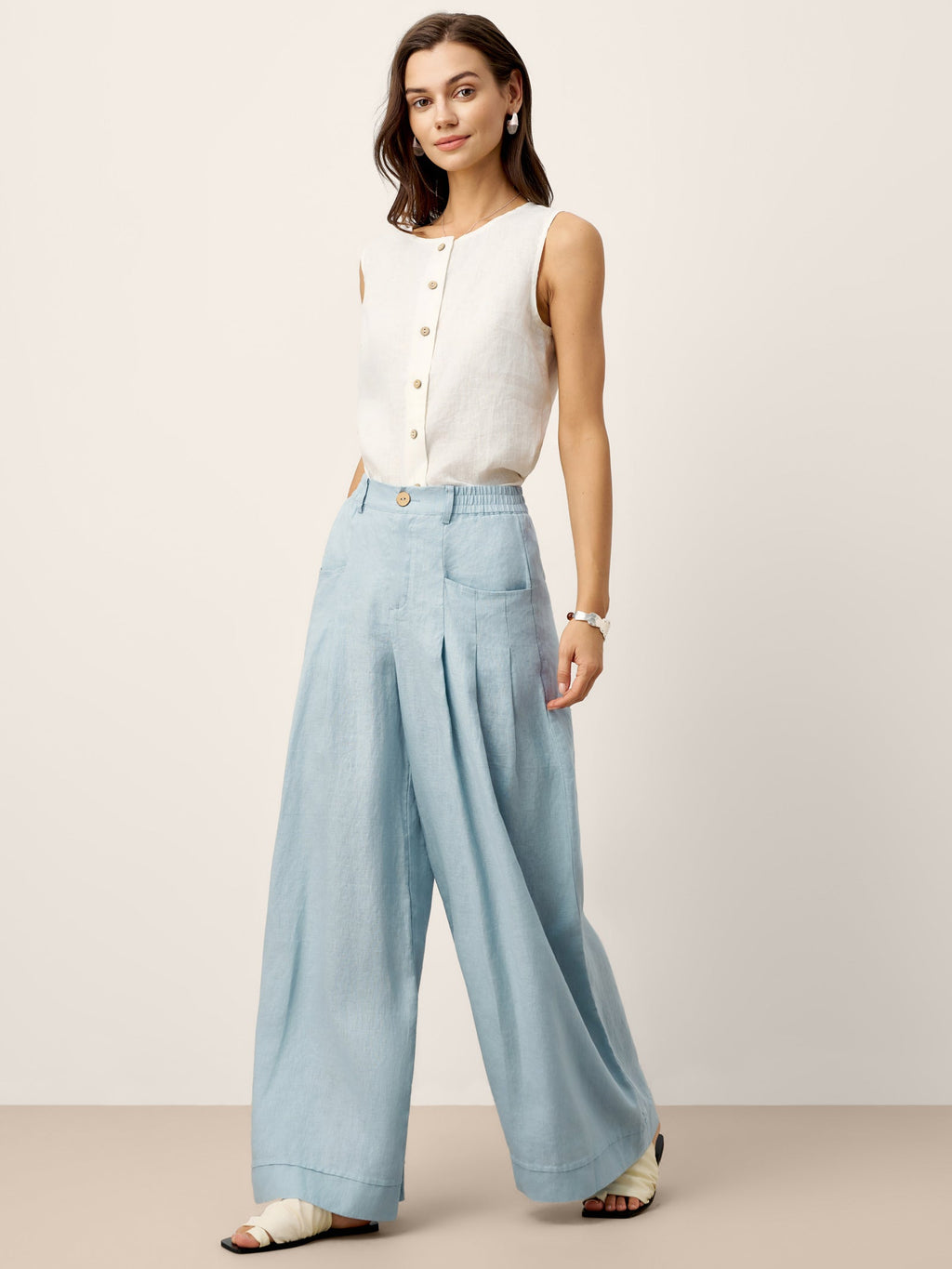 Pantalones relajados con pliegues