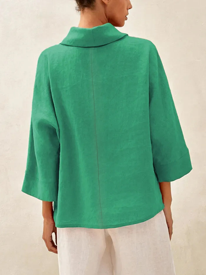 Top de lino con cuello doblado y mangas acampanadas