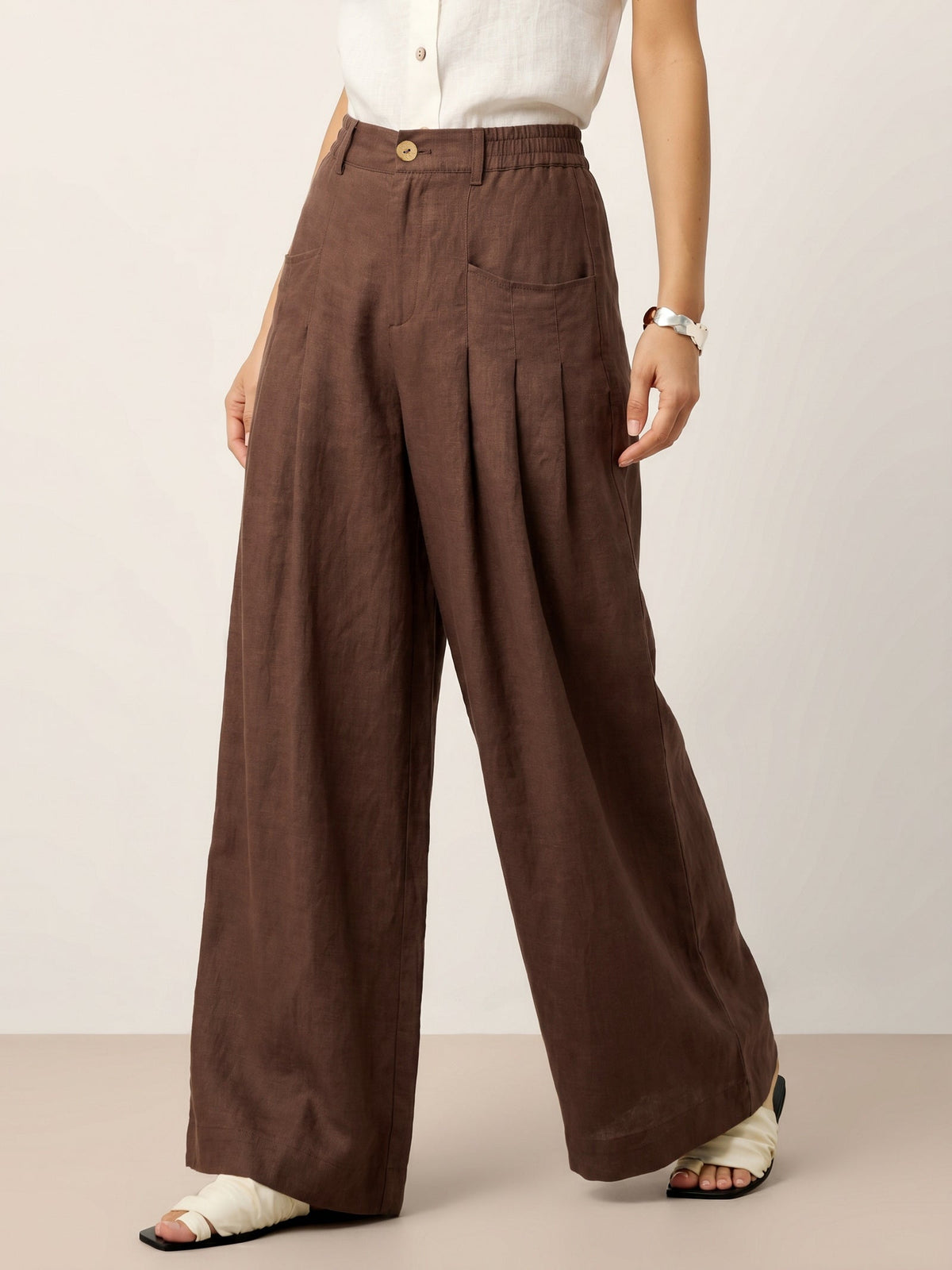 Pantalones relajados con pliegues