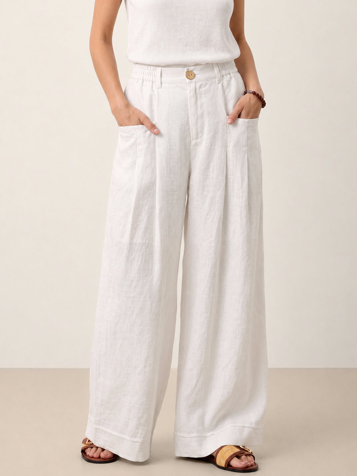 Pantalones relajados con pliegues