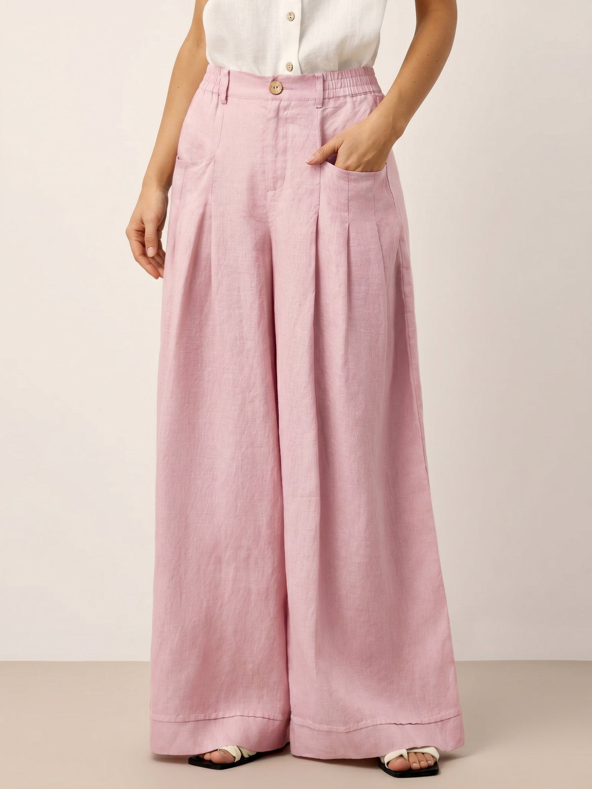 Pantalones relajados con pliegues