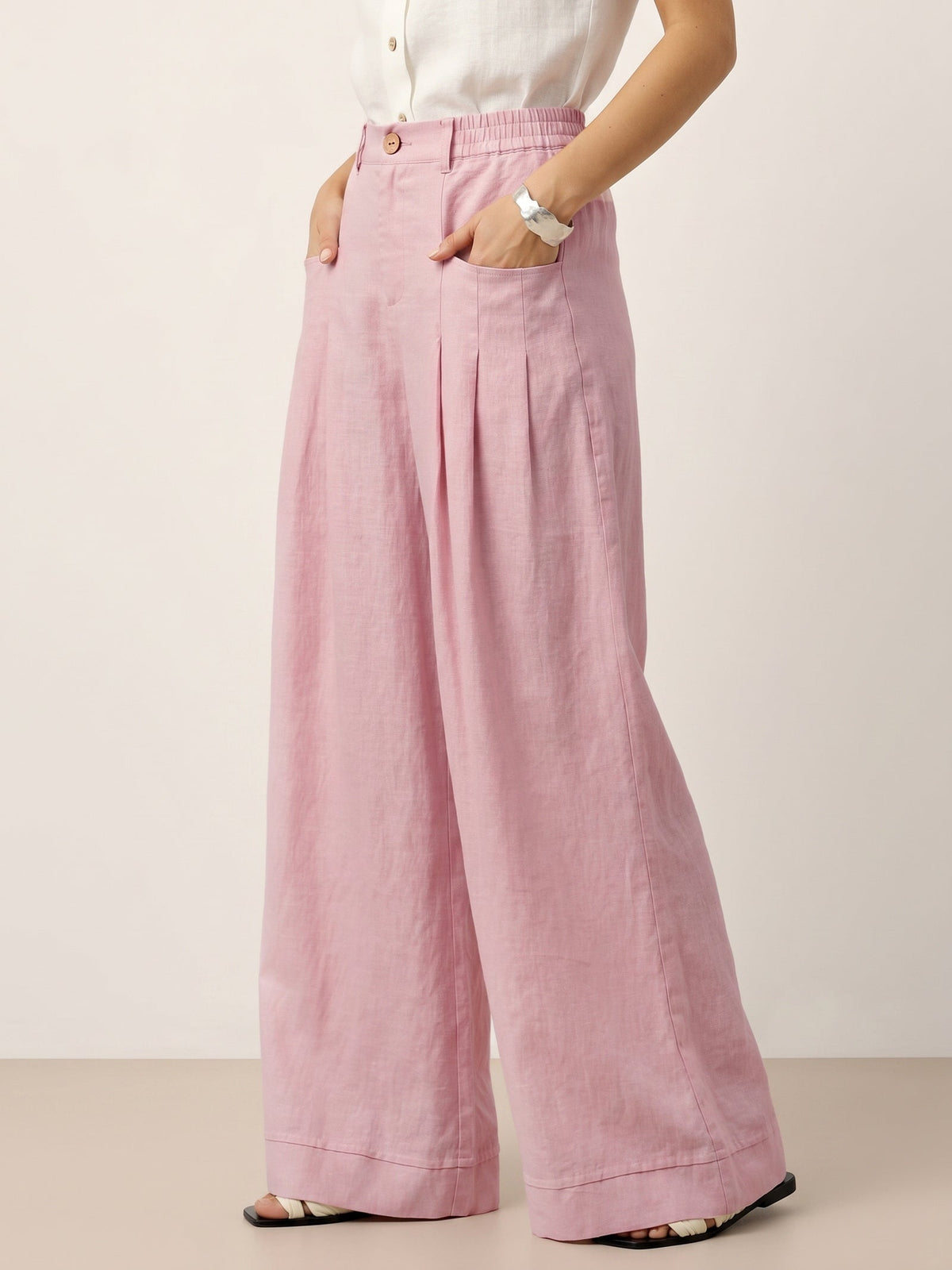 Pantalones relajados con pliegues