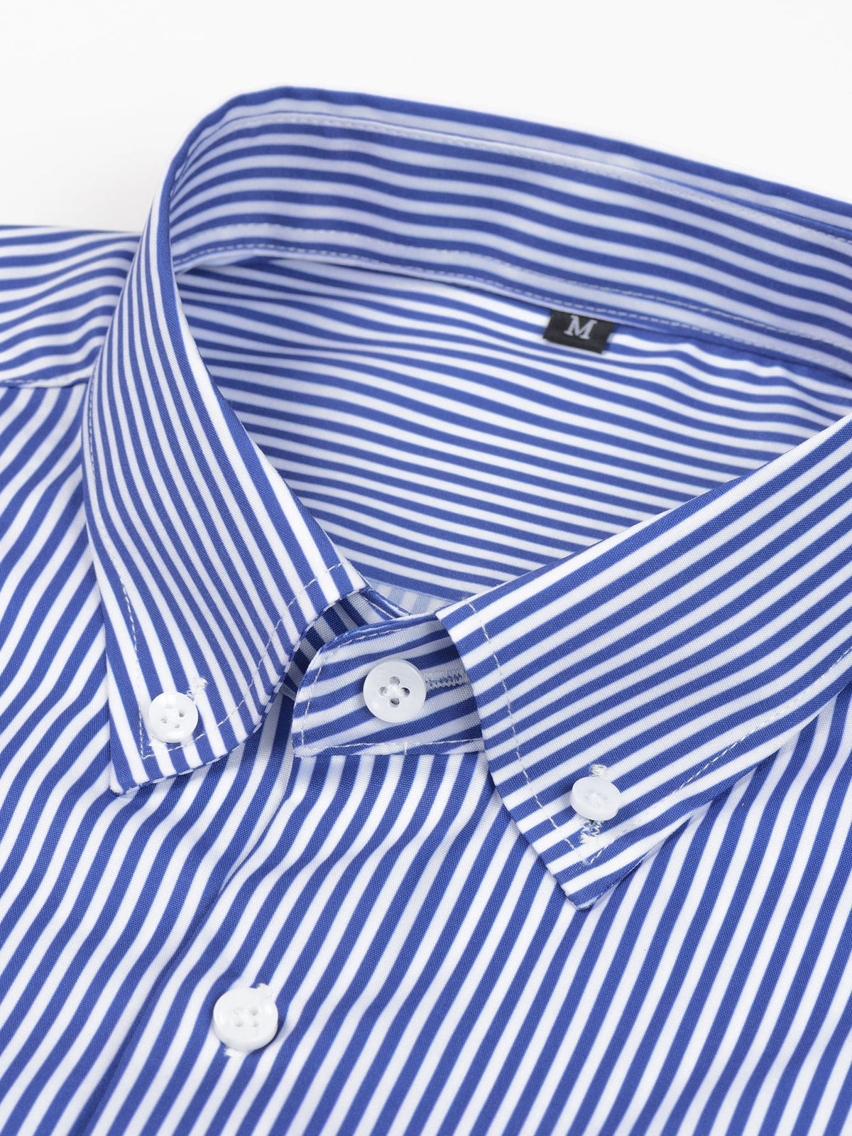 Camisa con botones de rayas de manga larga y pantalones ajustados de corte cónico