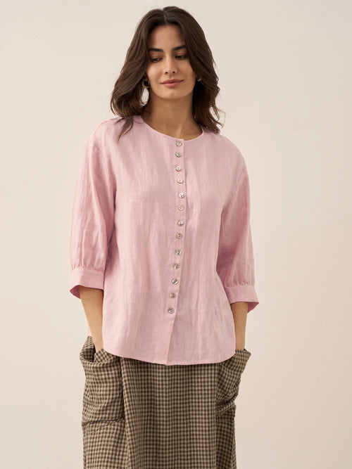 Blusa de lino puro con mangas abullonadas y espalda plisada