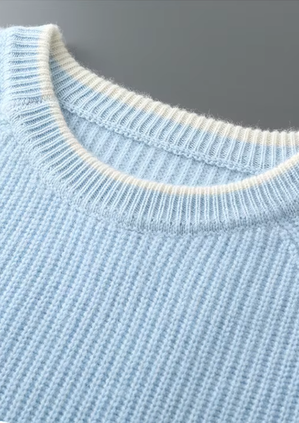 Jersey de lana bicolor con cuello redondo