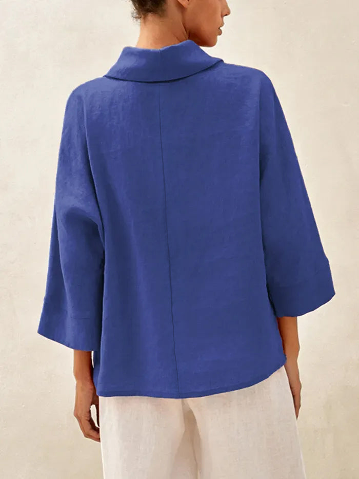Top de lino con cuello doblado y mangas acampanadas