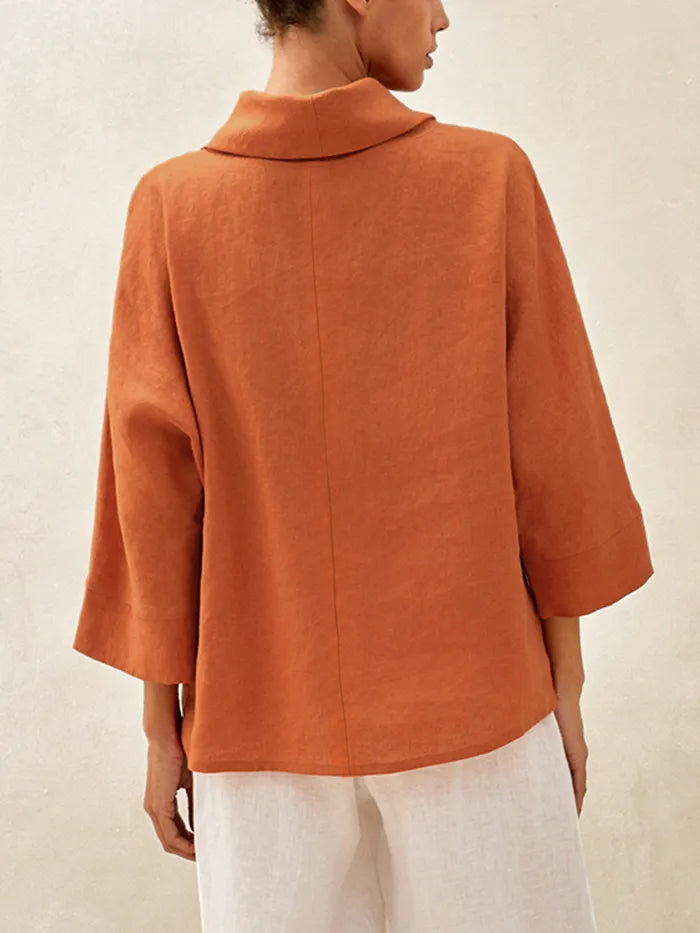 Top de lino con cuello doblado y mangas acampanadas