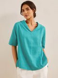 Camisa de lino con escote en V y manga corta