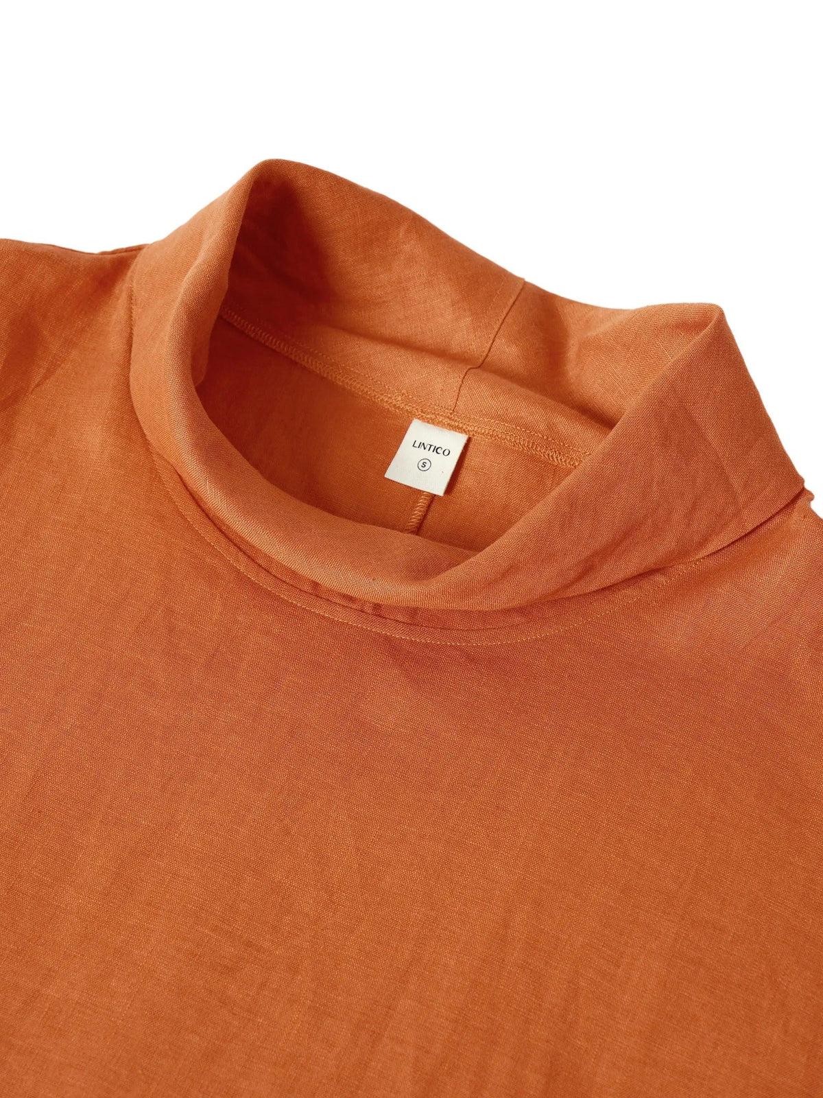Top de lino con cuello doblado y mangas acampanadas