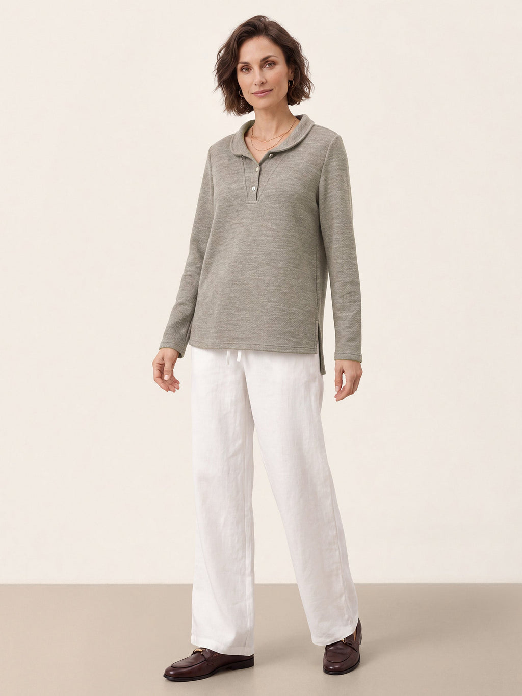 Top de punto con cuello Peter Pan en lyocell-lana y botones