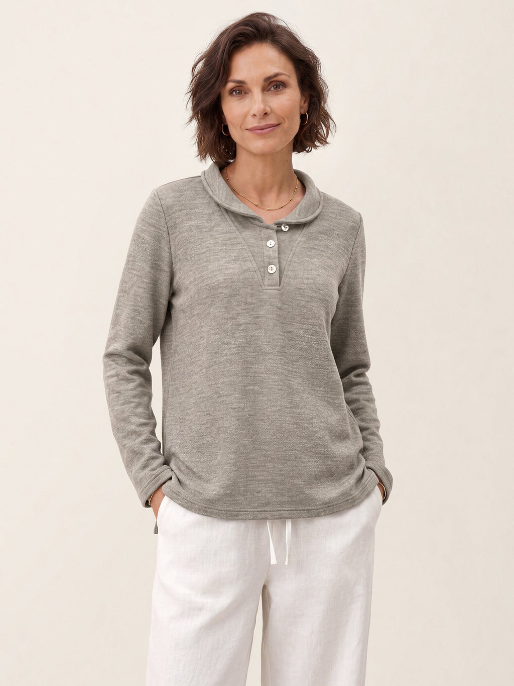 Top de punto con cuello Peter Pan en lyocell-lana y botones