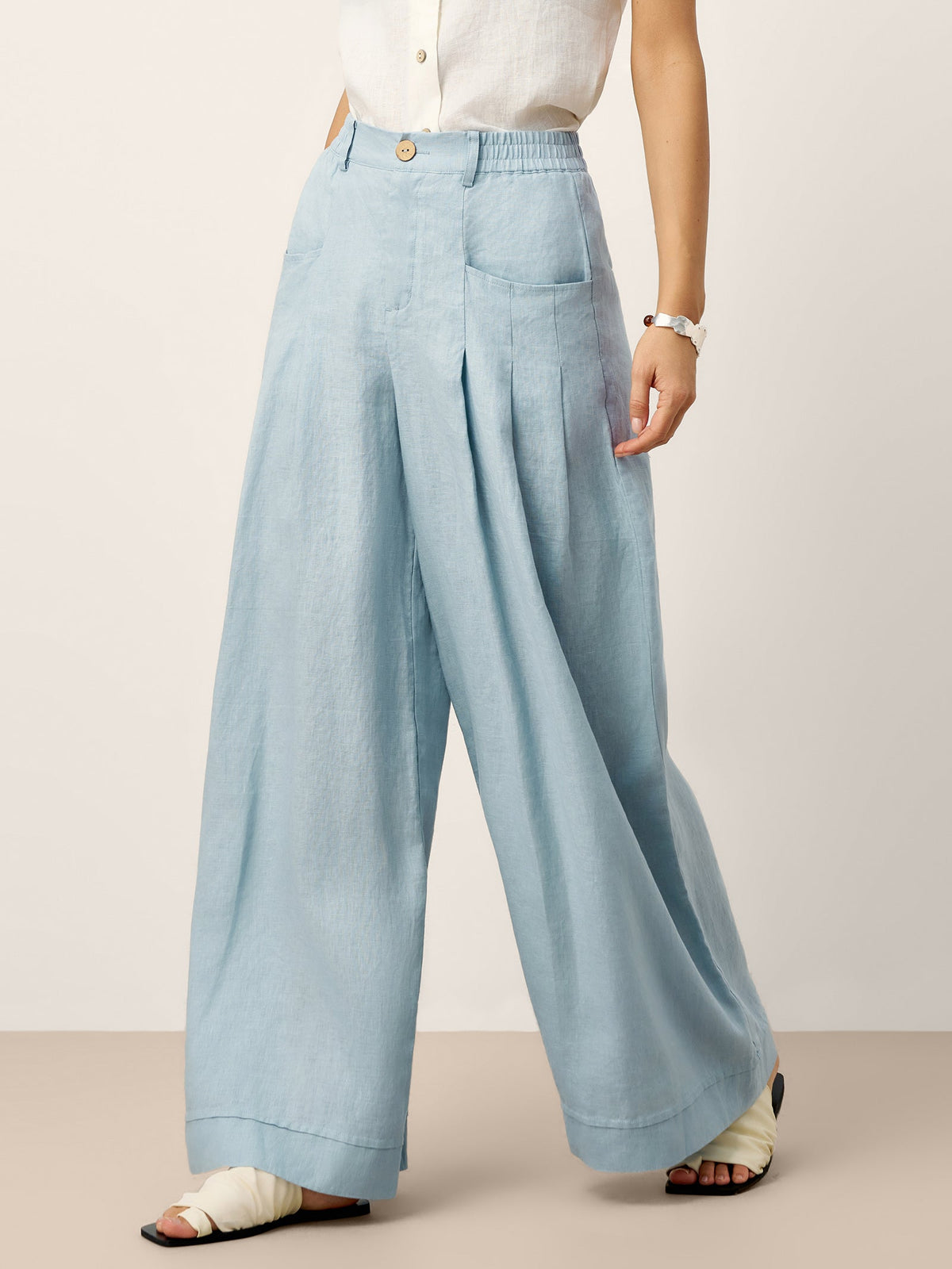 Pantalones relajados con pliegues